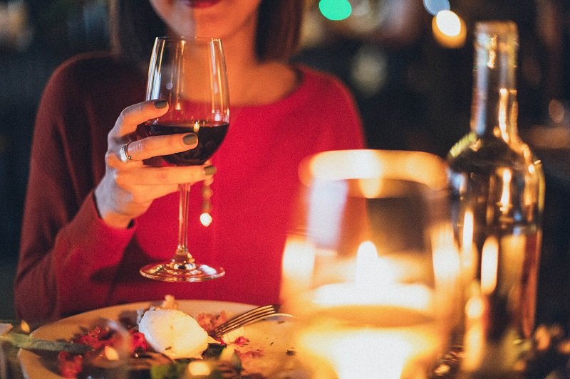 woman-holding-wine-glass